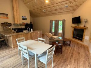 Black Fork River Cabin kitchen area viewed from dining room.