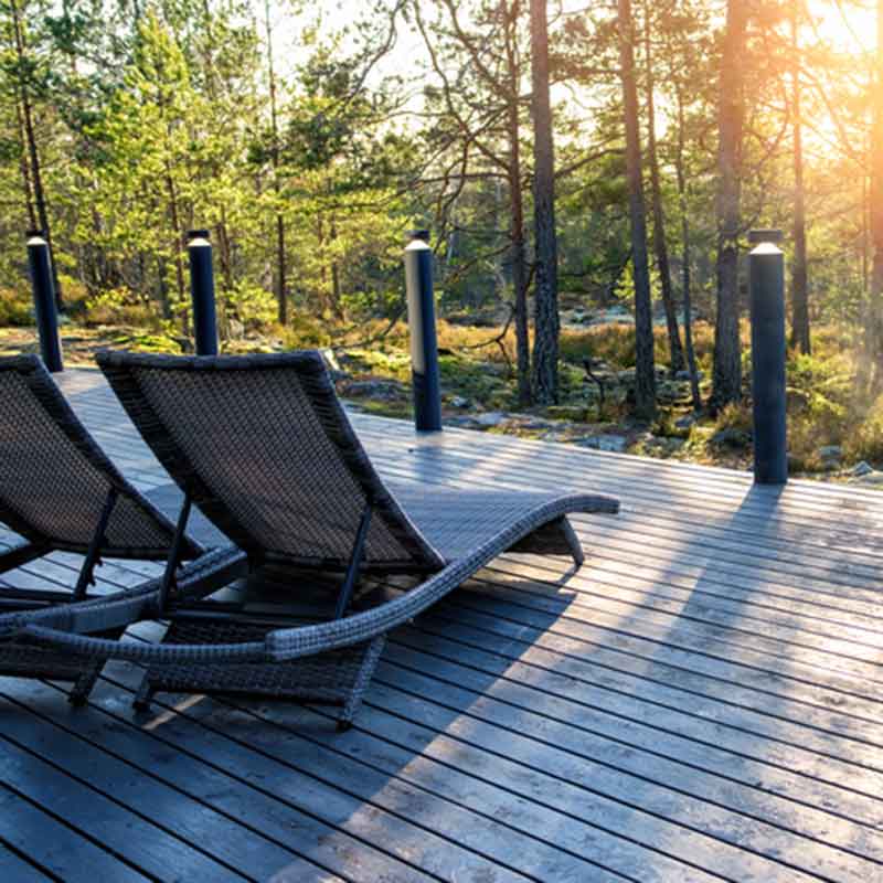 Lounge chairs on custom built deck on a cabin along the Cheat River in Parsons, WV.