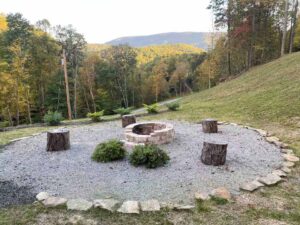 Hillview Cabin fire pit and chairs.